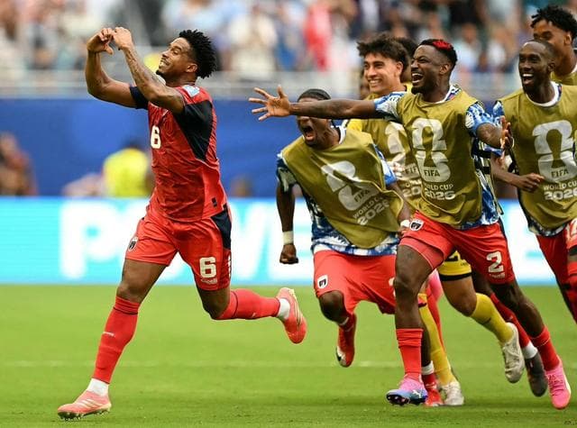Cabo Verde and Uruguay players competing during a World Cup Group H match.
