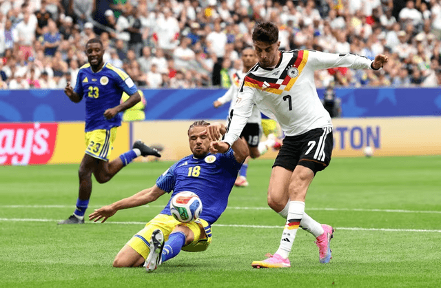 Germany players celebrating during a World Cup match against Curacao.